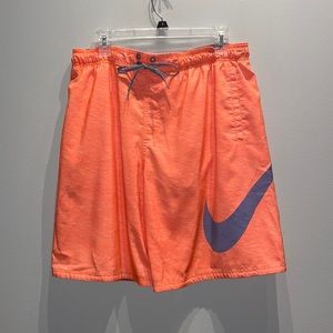 Nike neon orange swim trunks. Mens large. Good condition.